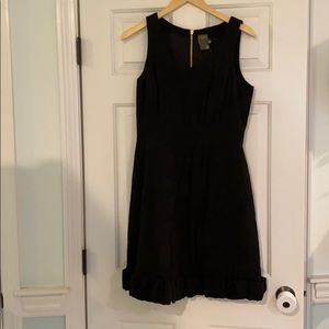 Taylor black dress with gold accent zipper